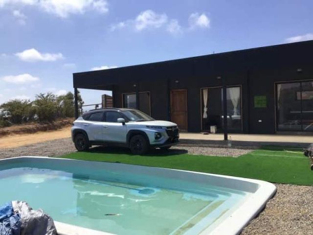 PARCELA CON CASA ESTILO MEDITERRANEA LIMACHE