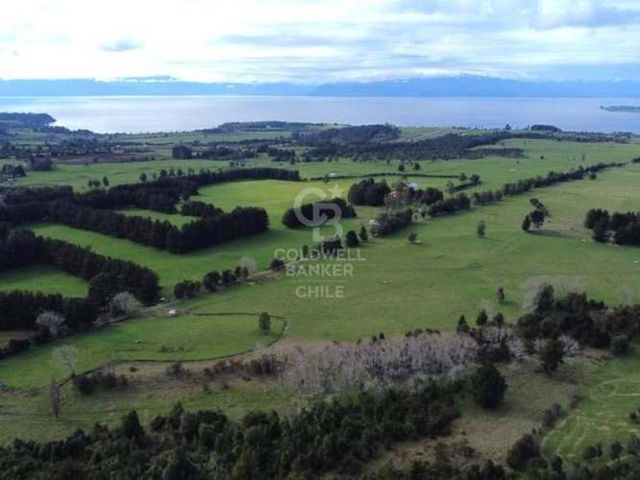 vista a los Volcanes cumbres de frutillar