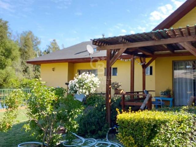 Parcela en calle principal Isla de Maipo