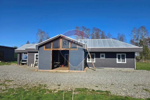 Venta parcela con casa y dos cabañas gran terreno