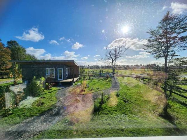 HERMOSA CASA  CON BOSQUE  EN FRUTILLAR