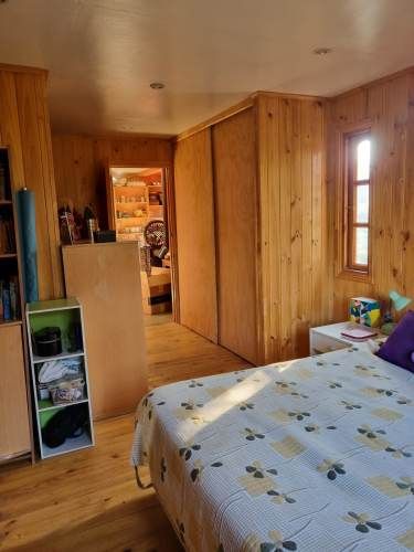 Parcela con hermosa casa de madera 100% nativa. 4 d.