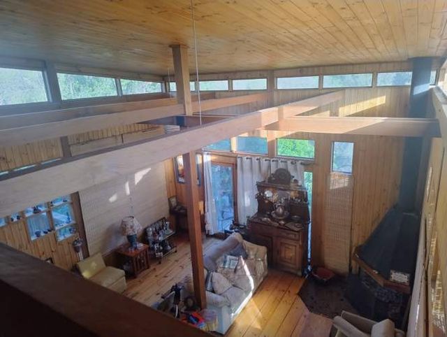 Parcela con hermosa casa de madera 100% nativa. 4 d.