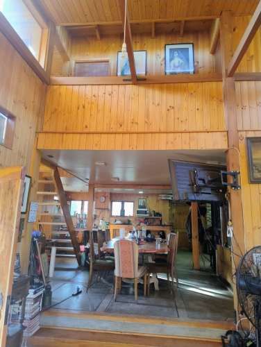 Parcela con hermosa casa de madera 100% nativa. 4 d.