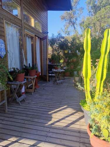 Parcela con hermosa casa de madera 100% nativa. 4 d.