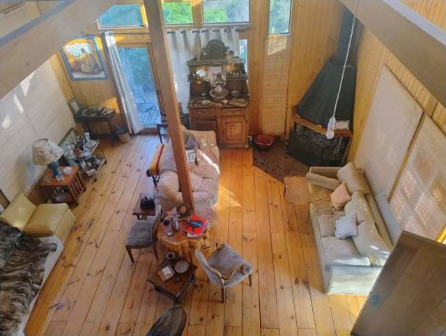 Parcela con hermosa casa de madera 100% nativa. 4 d.