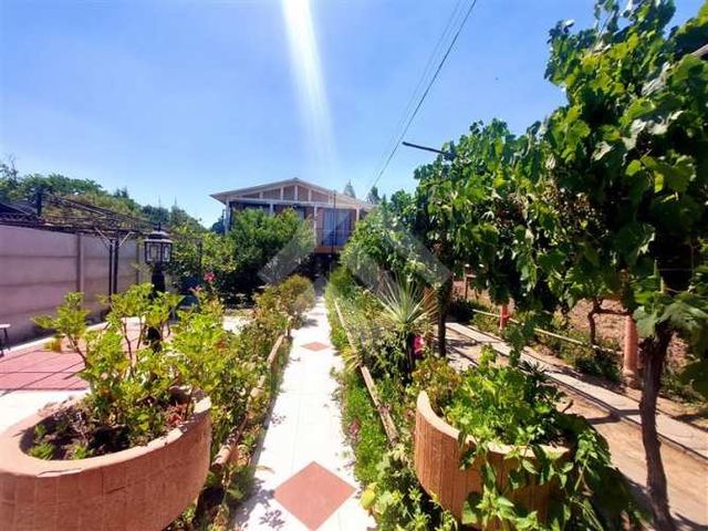 CASA 27 de Septiembre/ La Parroquiajs