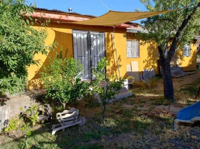 Venta de parcela con casa