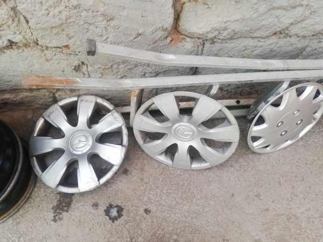 tapa de ruedas mazda 2 año 2014