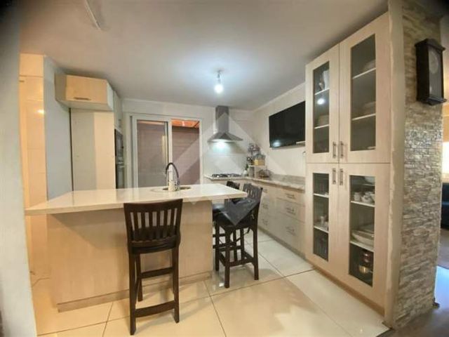 CASA Condominio Plaza Buin III/ Víctor Troncoso Muñoz