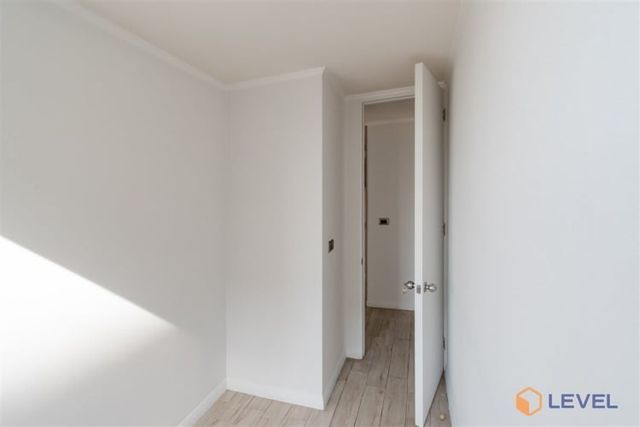 Depto San Ignacio 952, Piso 19, Vista Sur Oriente