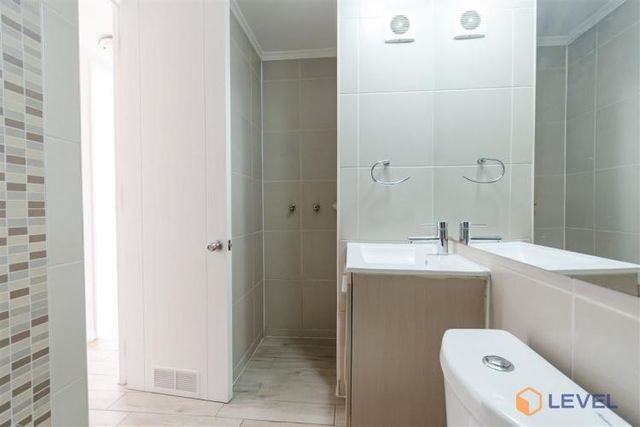 Depto San Ignacio 952, Piso 19, Vista Sur Oriente