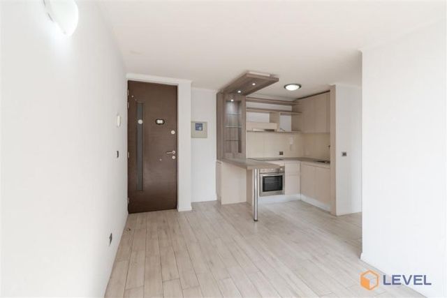 Depto San Ignacio 952, Piso 19, Vista Sur Oriente