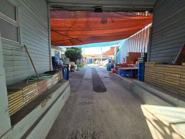 CENTRO DE BUIN: BODEGA Y LOCALES COMERCIALES EN 2.180 MT2