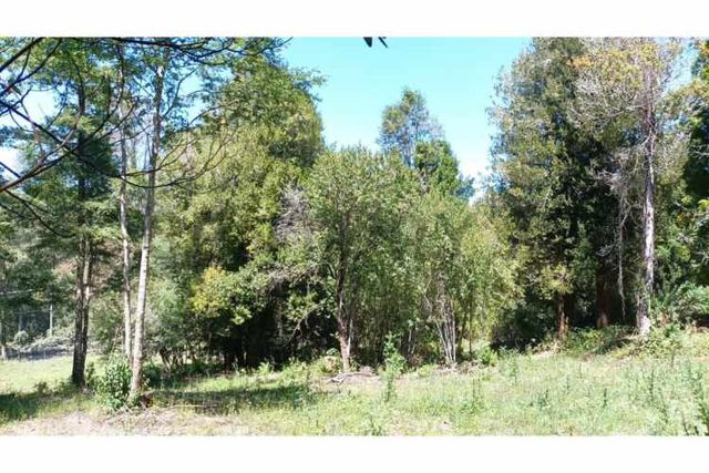Terreno con vista a volcanes y río Liucura, Pucón