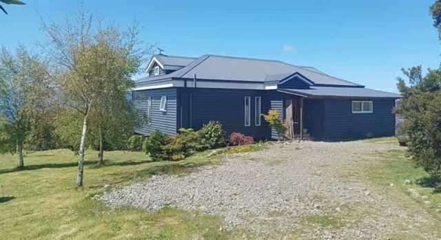 CASA ISLA PULUQUI. CALBUCO. REGION DE LOS LAGOS