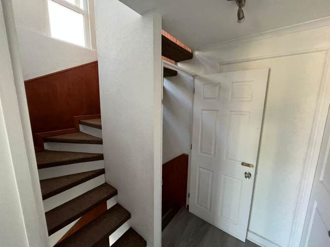 Casa de tres pisos en condominio Hacienda Huechuraba 6