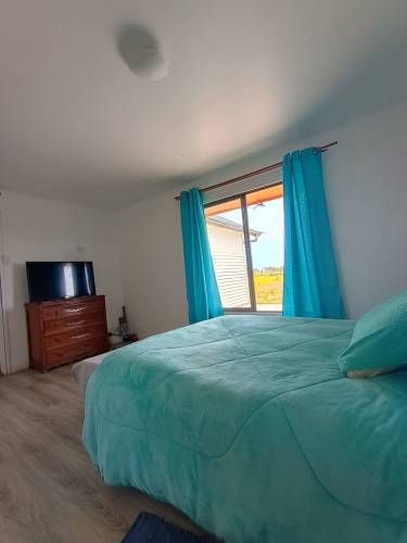 VENTA DE TERRENO CON CASA AMOBLADA