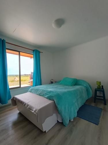 VENTA DE TERRENO CON CASA AMOBLADA