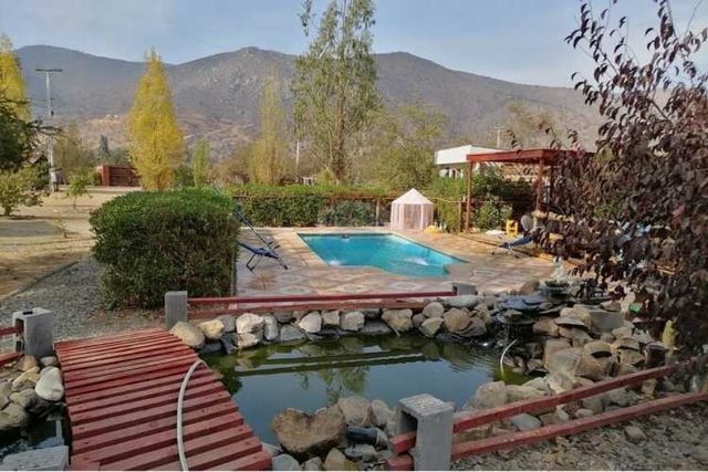 Parcela en curacaví 120/5.950m2-  frutales, pozo.