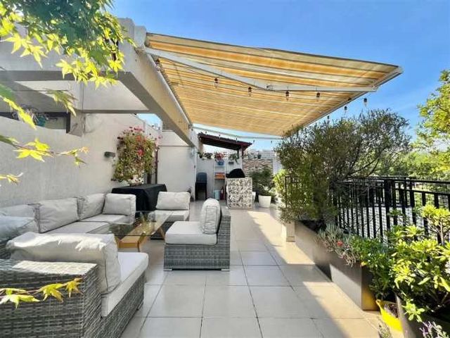 DÚPLEX CON ROOFTOP PRIVADO Y VISTA ORIENTE EN ÑUÑOA