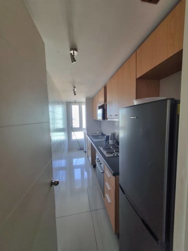 Departamento amoblado frente al mall del trebol