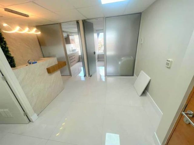 OFICINA Cerro El Plomo / Parque Araucano