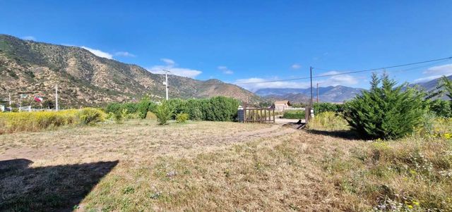 En venta, parcela de 5.000 m2., con casa de 2 dormitorios, en El Melón, Nogales.  120 M$
