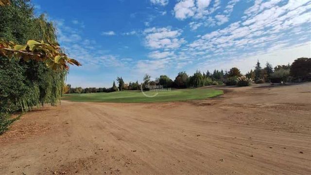 SITIO Las Brisas orilla de cancha cerca Club House