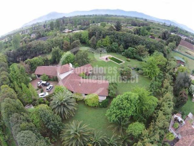 CASA Camino El Oliveto / Calera de Tango