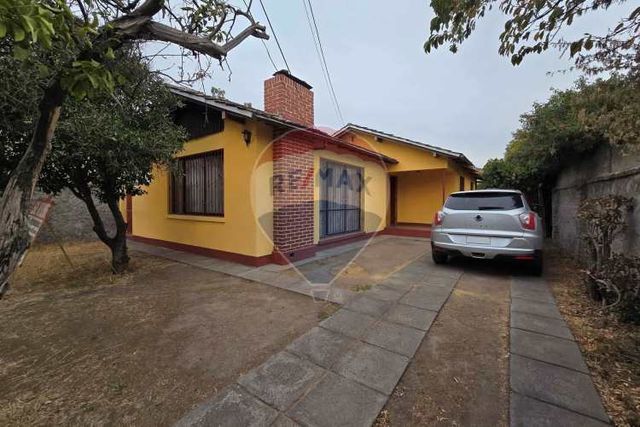 Gran terreno con amplia casa en la cisterna