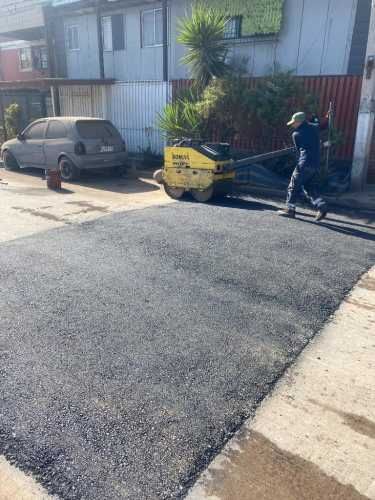 Maestro en Asfalto y ayudantes