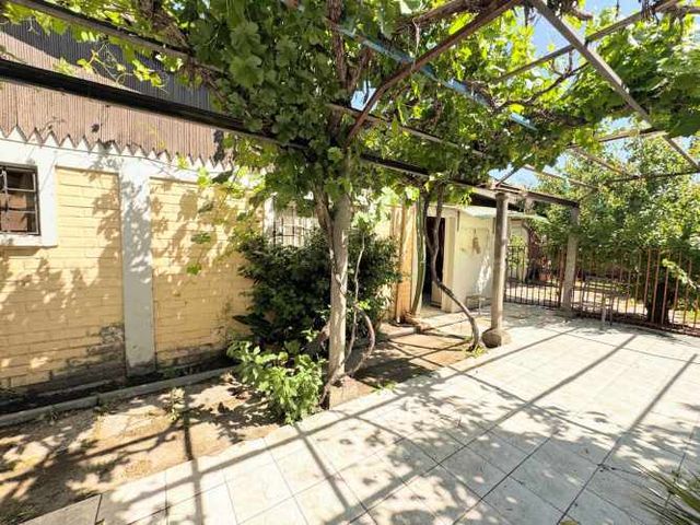 Gran Terreno y Depto interior en Huechuraba (129815)