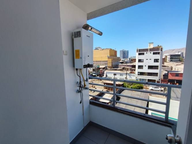 Departamento en arriendo c/ estacionamiento en Centro de Iquique