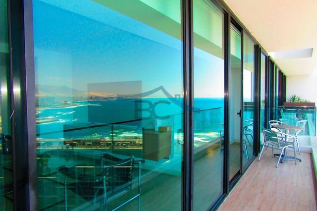 Moderno dpto en Puerto Nuevo amoblado. (130403)