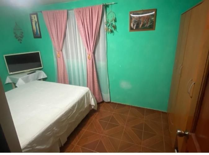 Pieza con estacionamiento