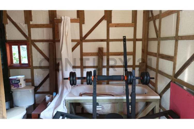 GRAN BODEGA Y DOS CABAÑAS EN PARCELA 12.000 M2 A 10 KM DEL CENTRO DE PUCON