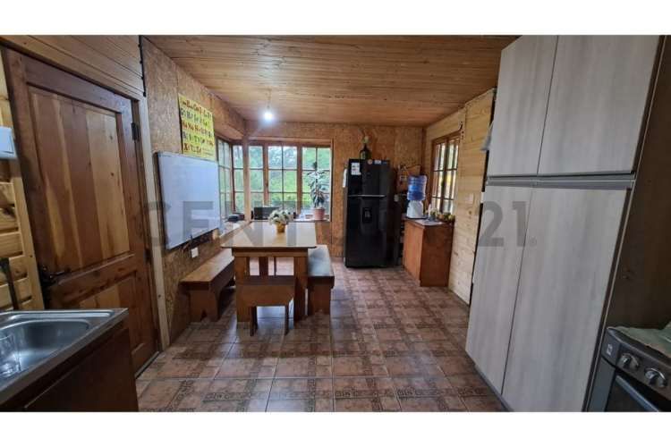 GRAN BODEGA Y DOS CABAÑAS EN PARCELA 12.000 M2 A 10 KM DEL CENTRO DE PUCON