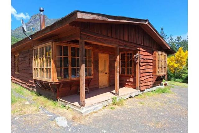 GRAN BODEGA Y DOS CABAÑAS EN PARCELA 12.000 M2 A 10 KM DEL CENTRO DE PUCON