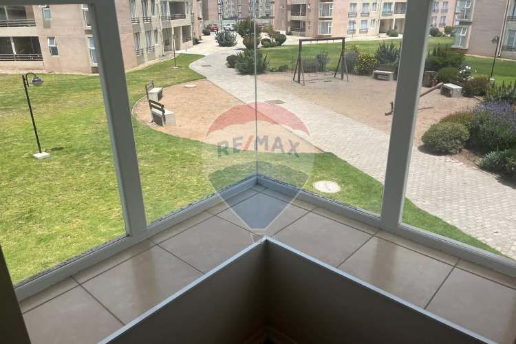 Depto 3 dormitorios en condominio con áreas verdes