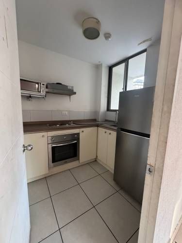 Estupendo departamento cerca de todo metro mall centros de salud en La Florida con estacionamiento y bodega