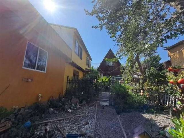 Sitio con 4 casas Villa El Progreso (132740)