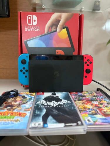 Nintendo Switch Semi nuevo + juegos 3