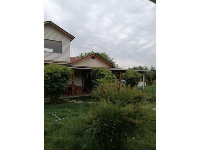 VENTA DE PARCELA CON CASA, DEPARTAMENTO, QUINCHO, JARDINES Y QUINTA FRUTAL EN CHADA, PAINE.