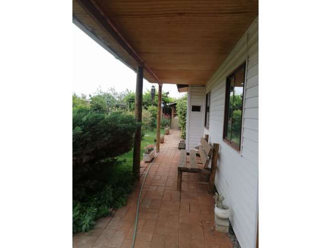 VENTA DE PARCELA CON CASA, DEPARTAMENTO, QUINCHO, JARDINES Y QUINTA FRUTAL EN CHADA, PAINE.