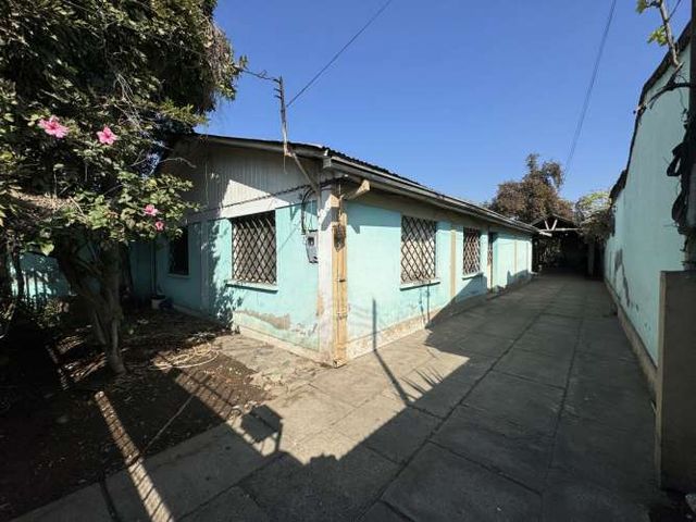 Terreno con 3 Casas de Excelente Potencial Comercial Pob. Malaquías Concha