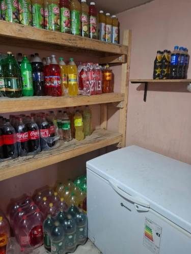 Venta de botillería más casa