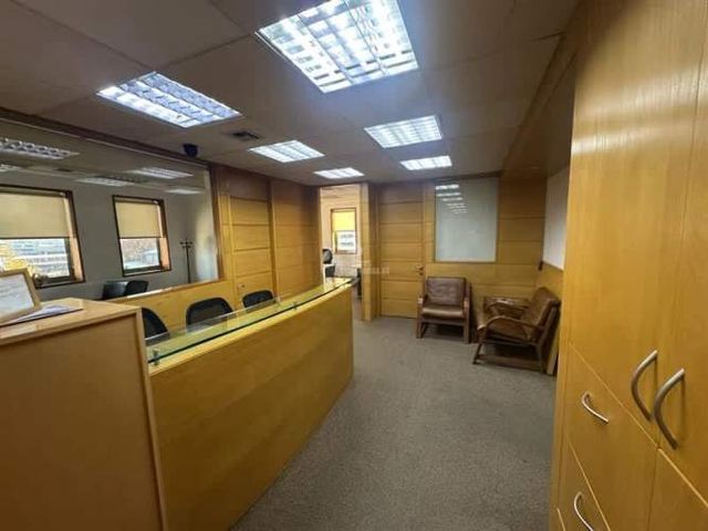 OFICINA Encomenderos / Vitacura