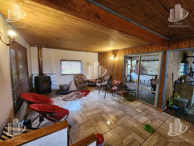 PARCELA CON CASA LONGAVÍ