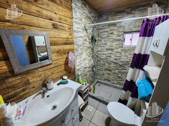 PARCELA CON CASA LONGAVÍ